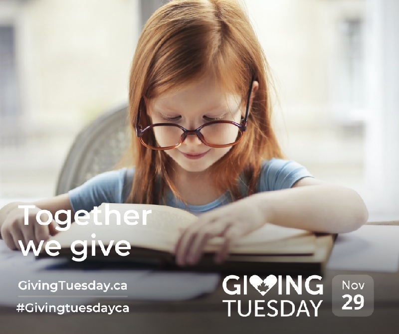 Girl reading a book with smile on her face