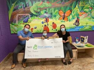 Cheque presentation for $200 from Alexa and her family