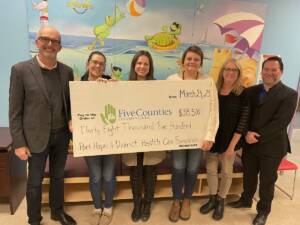 Photo of donation from Port Hope Health Care Foundation to Five Counties.