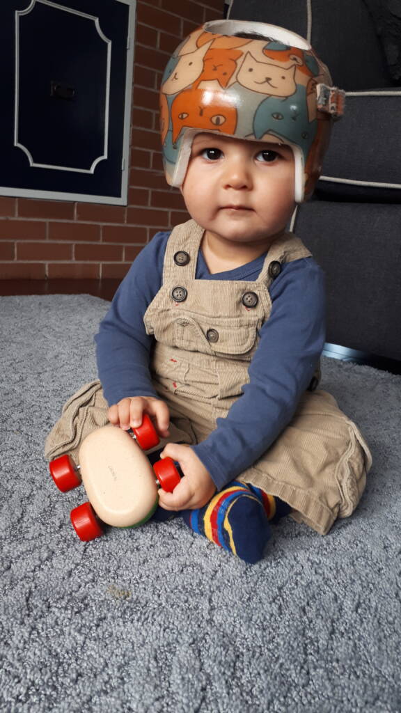 Oliver wearing a helmet