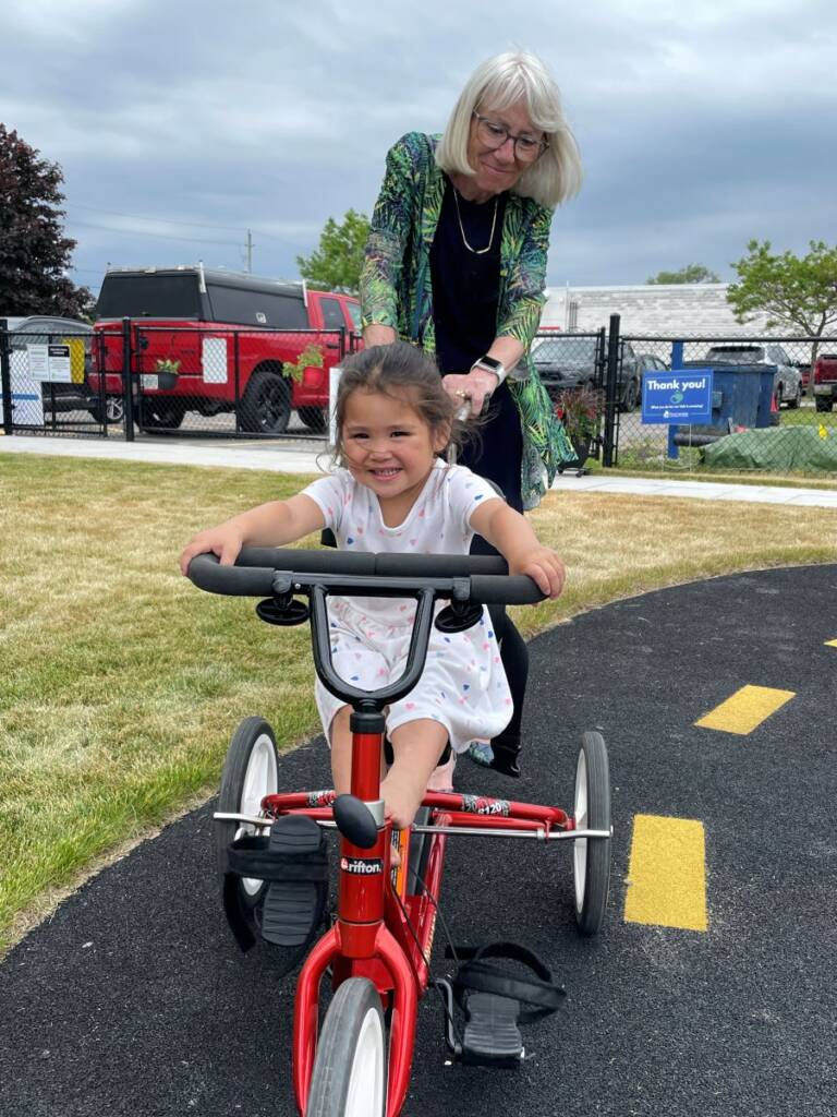 Pushing a bike on accessible track