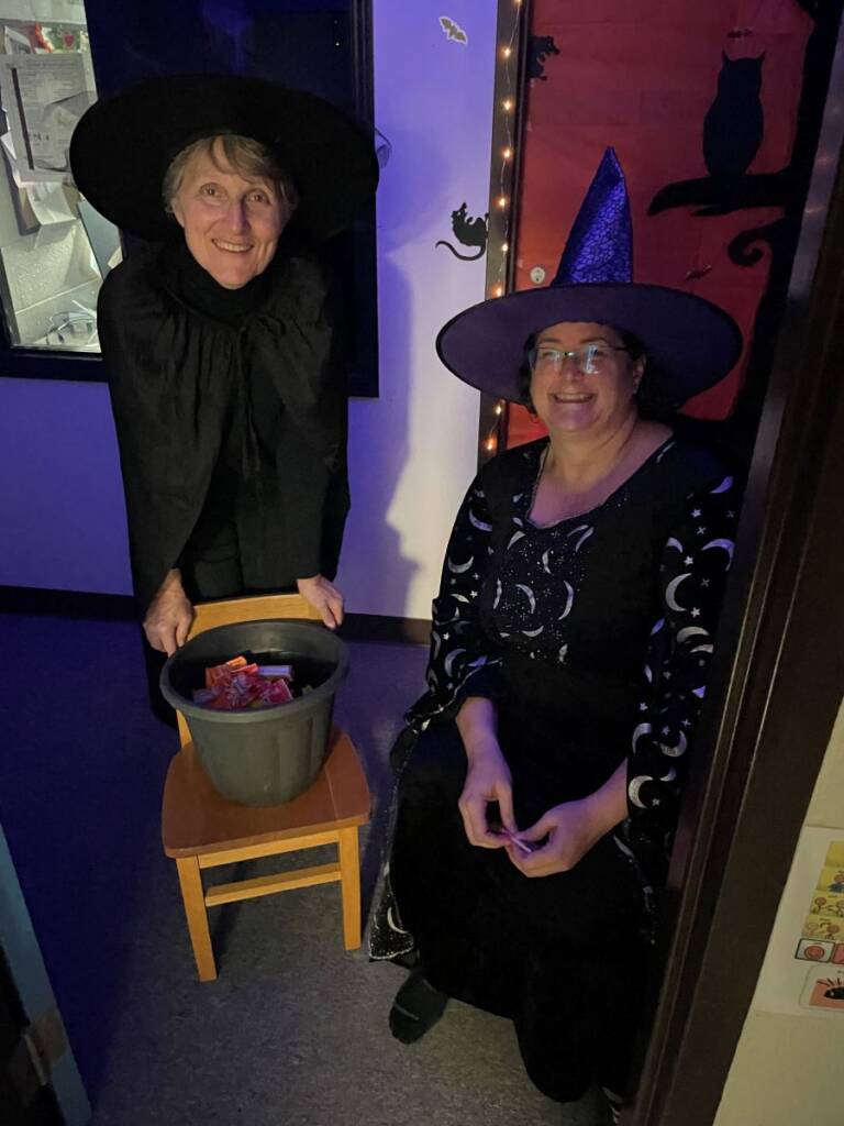 Five Counties staff handing out candy at All-o-ween
