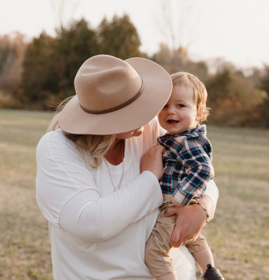 Jenna holding her son Watson