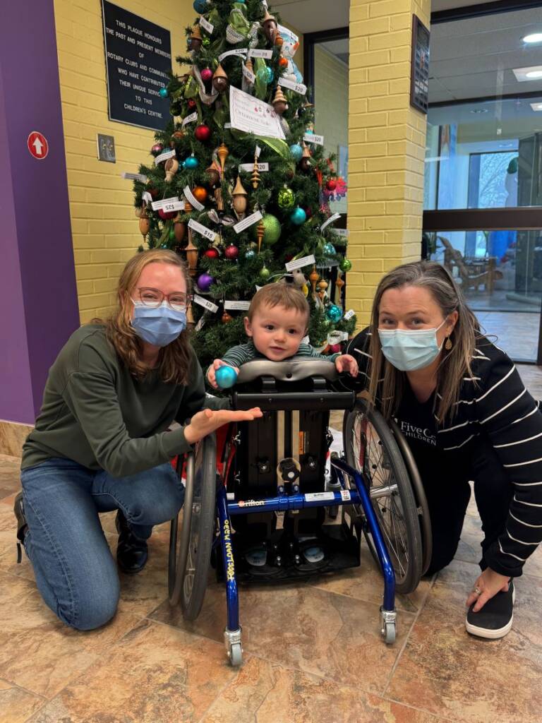Arthur poses with two of his Five Counties clinicians.